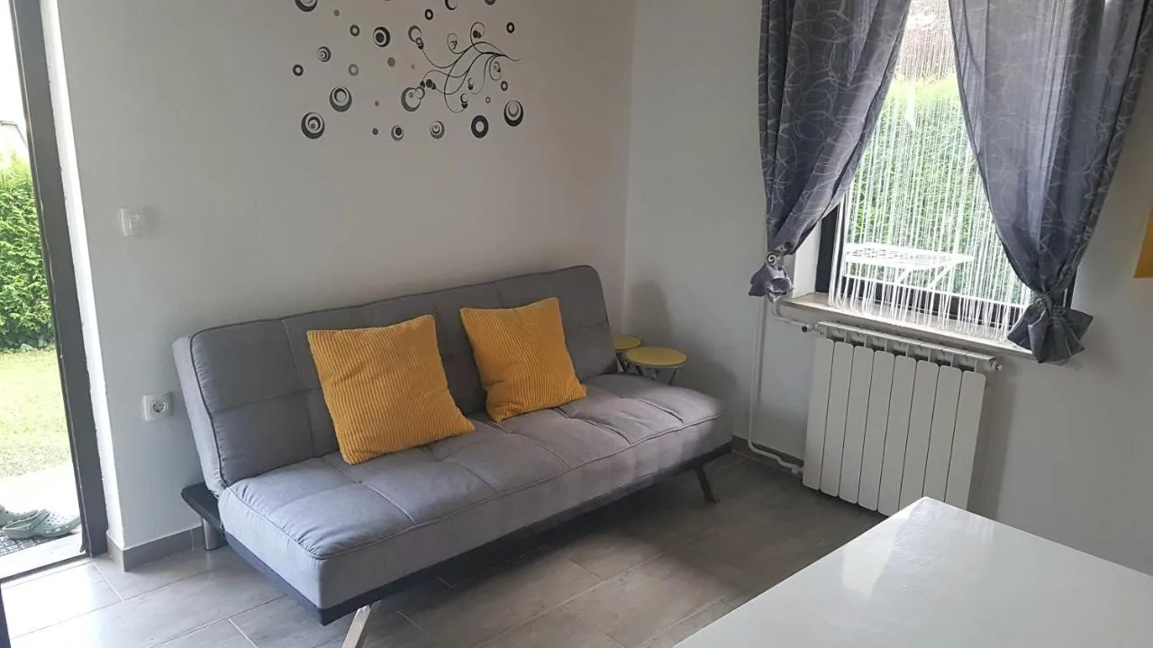 Sofa with yellow cushions
